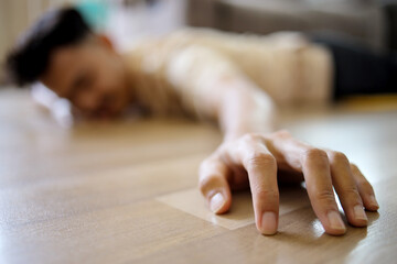 Man Passing Out Accident Fainting and Falling on The Floor Caused By Hypotension or Heart Condition