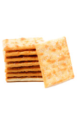 A stack of sweet crispy cracker sprinkled with sugar on top, set against a clean white background. The golden brown crackers create a simple yet appetizing display
