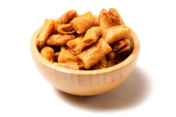A bowl of Sumpia, Indonesian traditional mini spring rolls filled with shrimp floss. The crunchy...