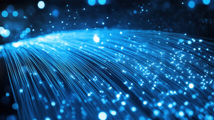 Obraz premium vibrant display of blue light trails and sparkling particles creates mesmerizing effect, symbolizing future of digital communication and technology