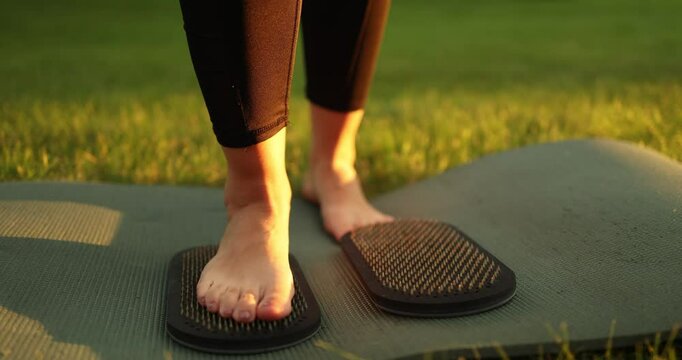 Meditative practice of alternative healing, barefoot standing on nails sadhu board, restoration of mental health. High quality 4k footage