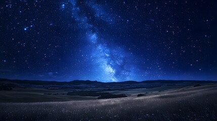 Naklejka premium 143. A dramatic starry night sky over a quiet countryside