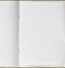 Empty notebook pages offer a clean slate for creative writing background.