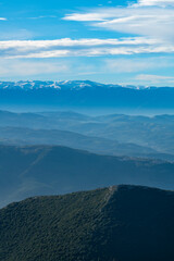 Fototapeta premium Mountain landscape at sunset. View of the mountains from above in the evening. Sunset view of the mountain range. Sunset in the mountains. Bursa trekking routes. Bursa, Türkiye.