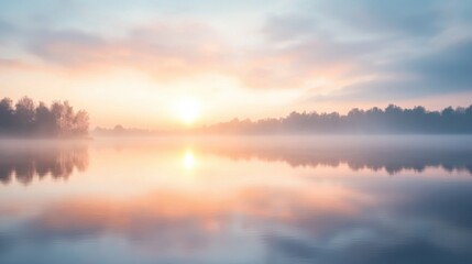 Naklejka premium A beautiful sunrise over a lake with a foggy sky