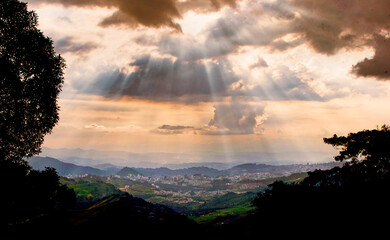 Biblical Lights, an atmospheric view over the city of Manizales, Colombia.