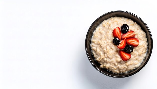 bowl of Porridge or oatmeal is a food made by heating or boiling ground, crushed or chopped starchy plants, typically grain, in milk or water. often with honey, sugar, milk, fruit added for flavor.