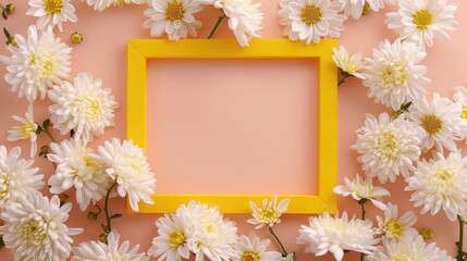 Obraz premium White chrysanthemums in yellow wooden frame on peach background top view Women s Day card