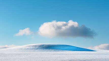 Frosty scenery with blue sky and a solitary rolling cloud