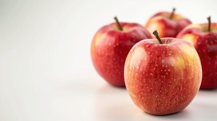 Fresh juicy red golden apples for sale at market with selective focus and shallow depth of field on white background