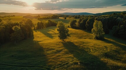 Obraz premium Summer evening drone photography of meadows