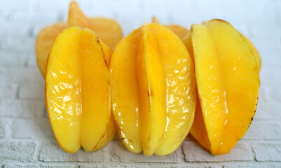 Ripe starfruit is yellow. Ready to eat.