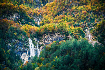 Autumn in Val Raccolana. Between peaks, lakes and streams. Julian Alps