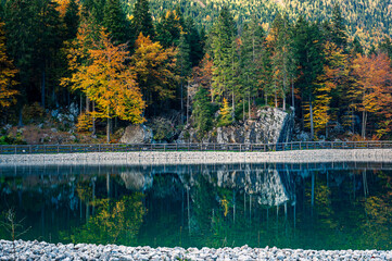 Autumn in Val Raccolana. Between peaks, lakes and streams. Julian Alps