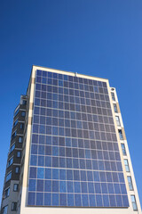 Many solar panels texture with copyspace. Building with lots of solar panels. Renewable solar energy. Alternative Generator Energy efficient house uses solar energy of sun.