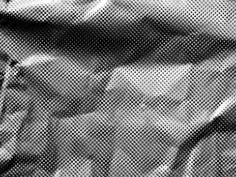 Crumpled paper texture. Vector halftone background. Dotted black and white overlay bg in punk style for collages. Grungy monochrome noise craft paper illustration
