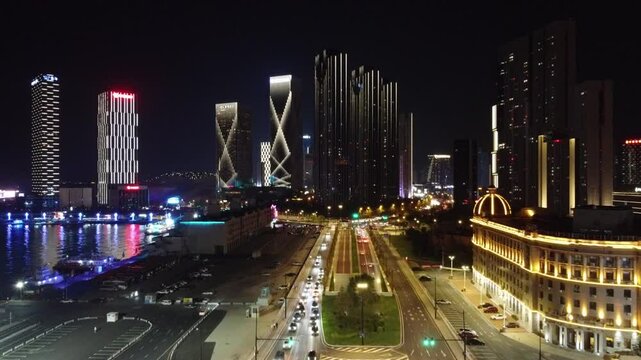 Aerial night view of Dalian port and financial center