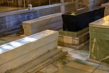 Sarcophagi of Timur and his family inside the Gur-e-Amir Mausoleum, traditional stone carvings and historical significance. Samarkand, Uzbekistan