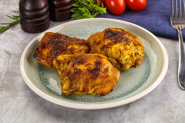 Roasted chicken thighs  with spices