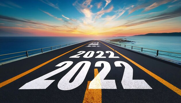 new year written asphalt road marking lines sea landscape representing travel recovery