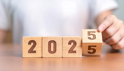 Naklejka premium wooden cubes flipping symbolizing business growth goals
