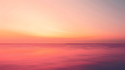 Obraz premium Soft, blurry sunset over a sea of clouds.