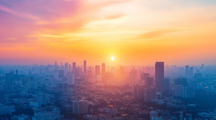 Fototapeta premium A vibrant cityscape during sunset. The sky is painted in hues of orange, pink, and blue, with the sun setting in the center. The city is dotted with numerous skyscrapers, each varying in height