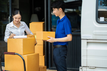 Asian delivery man deliver box parcel package to customer at home office, shipping delivery concept.