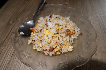 Nasi goreng dish served with fried rice, fried egg and chicken