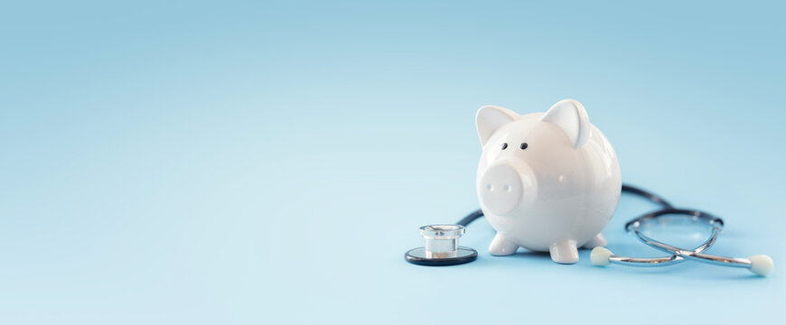 Piggy bank with stethoscope background, medical insurance or money health checkn concept