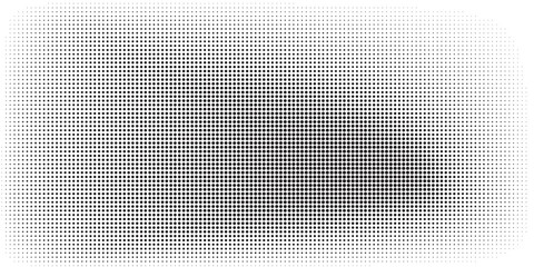 Abstract halftone dots texture background. Grunge black and white backdrop.
