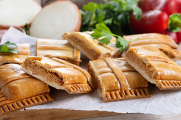 Tuna pie on wooden table(empanada gallega). Traditional spanish food.
