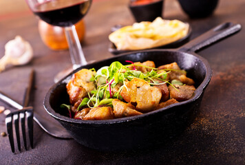 Fried meat with herb and spices.