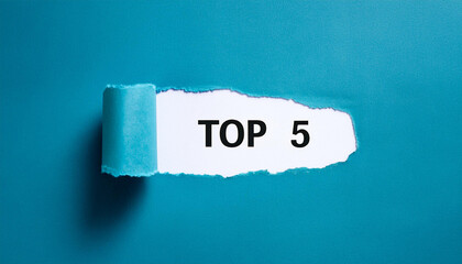Torn paper revealing text Top 5, bright background. Business concept.