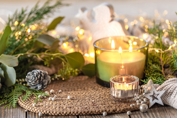 Cozy Christmas composition. Christmas candle.
