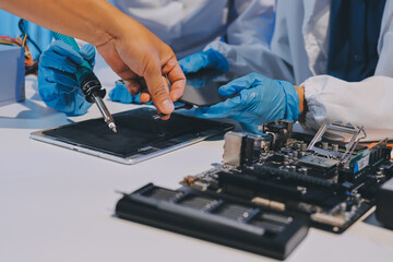 Electronics technician, electronic engineering electronic repair, electronics measuring and testing, repair and maintenance concepts.