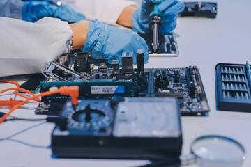 Electronics technician, electronic engineering electronic repair, electronics measuring and testing, repair and maintenance concepts.