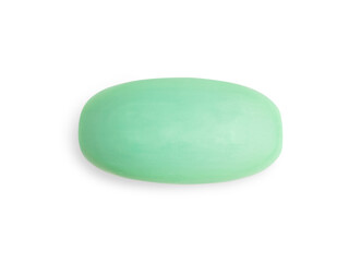 Elevated top view of single dry hygienic handmade natural antibacterial soap bar of green colour isolated on white background used as toiletries cosmetics for skin and body care for bath and shower