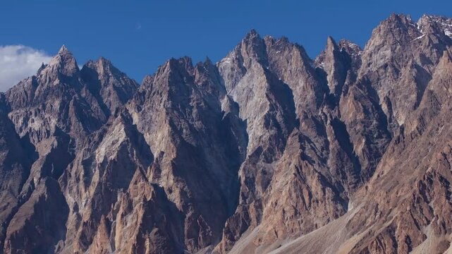 Close Up Panning Shot of Passu Cones Mountains on Summer Day