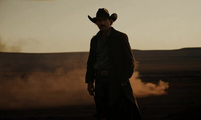 Cowboy in a Dusty Landscape