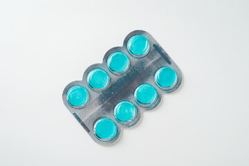 medical Lozenges tablets mint flavor in blister packaging on a white background