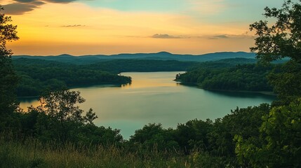 Perched at the top of a hill, a breathtaking view unfolds over a serene lake nestled below, offering a "top of the world" perspective. 
