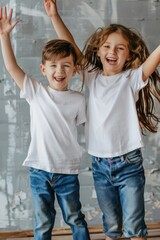 Obraz premium Joyful Siblings Smiling and Celebrating with Raised Hands in Casual Outfit