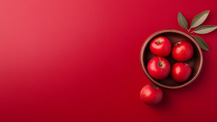 red apples on red background