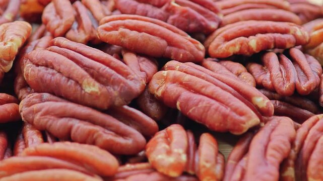 Close up shot of pecans spinning