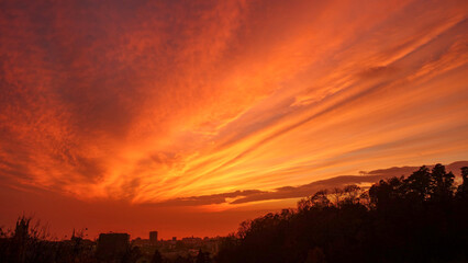 Sunset from Lausanne with an orange sky.