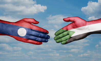 Sudan and Laos country handshaking with flags, consensus concept international co-operation illustration