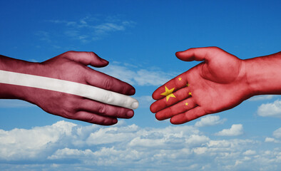 China and Latvia country handshaking