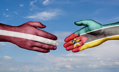 Mozambique and Latvia country handshaking