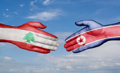 North Korea and Lebanon country handshaking with flags, consensus concept international co-operation illustration